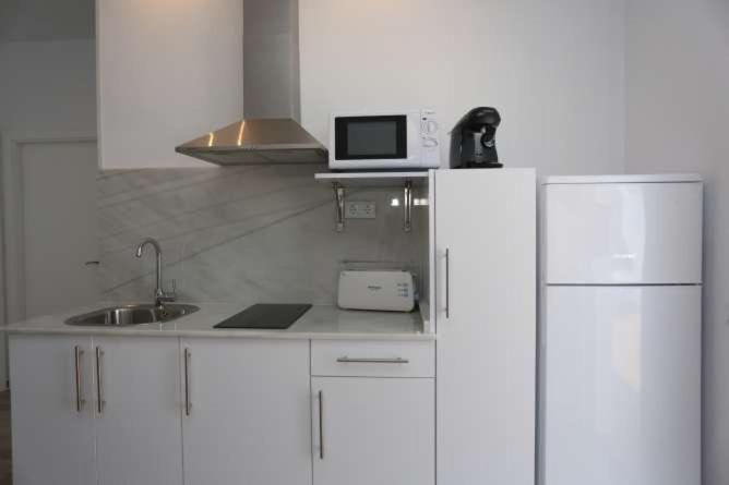 Apartamentos La Mar Sala Piscina Compartida 科尼尔-德拉弗龙特拉 外观 照片